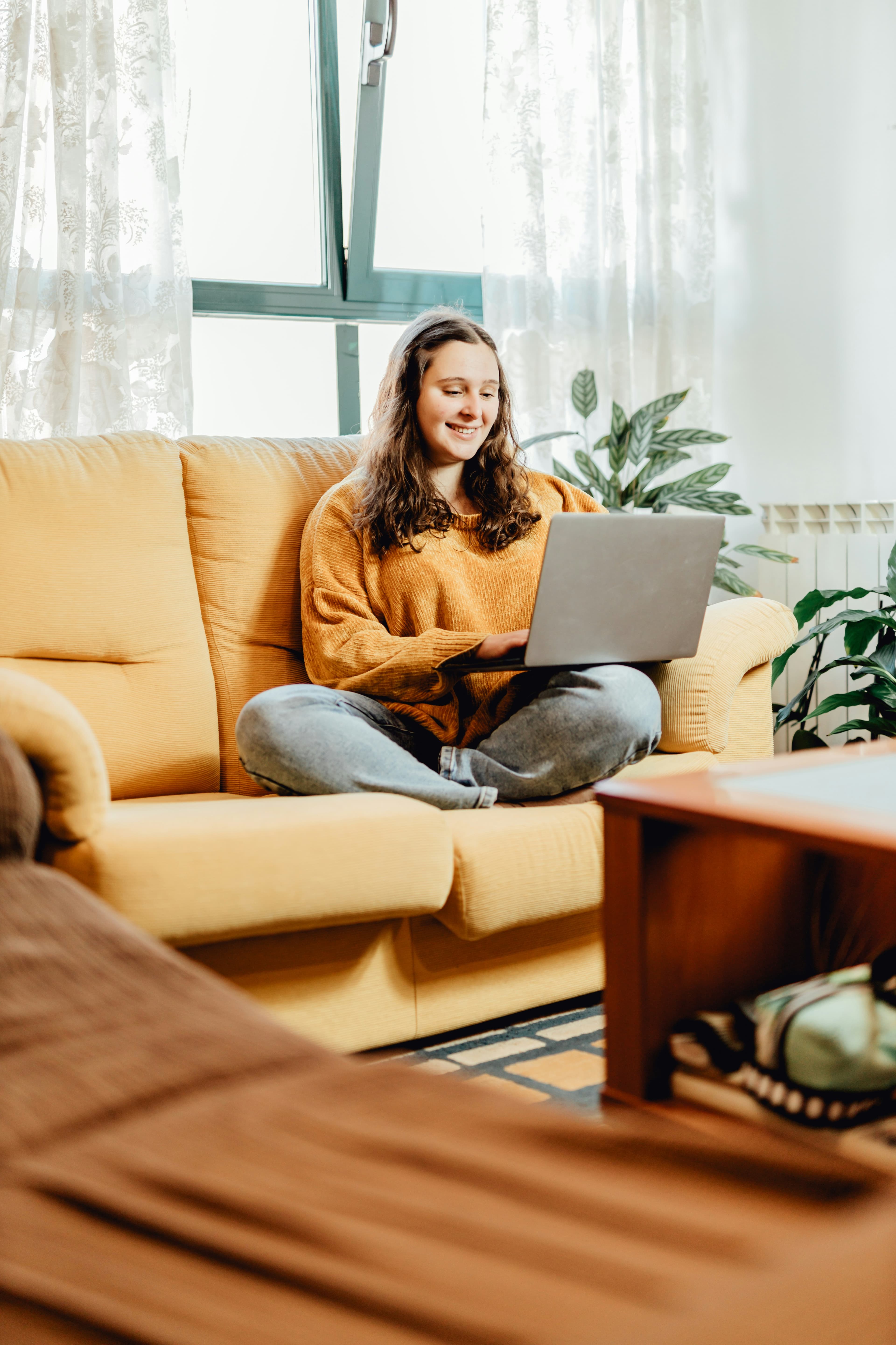 Woman completing consultation on laptop